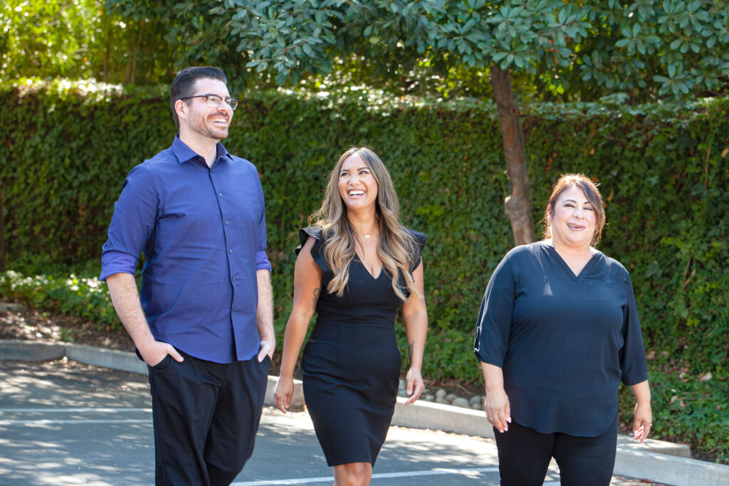 A photo of team members walking and laughing