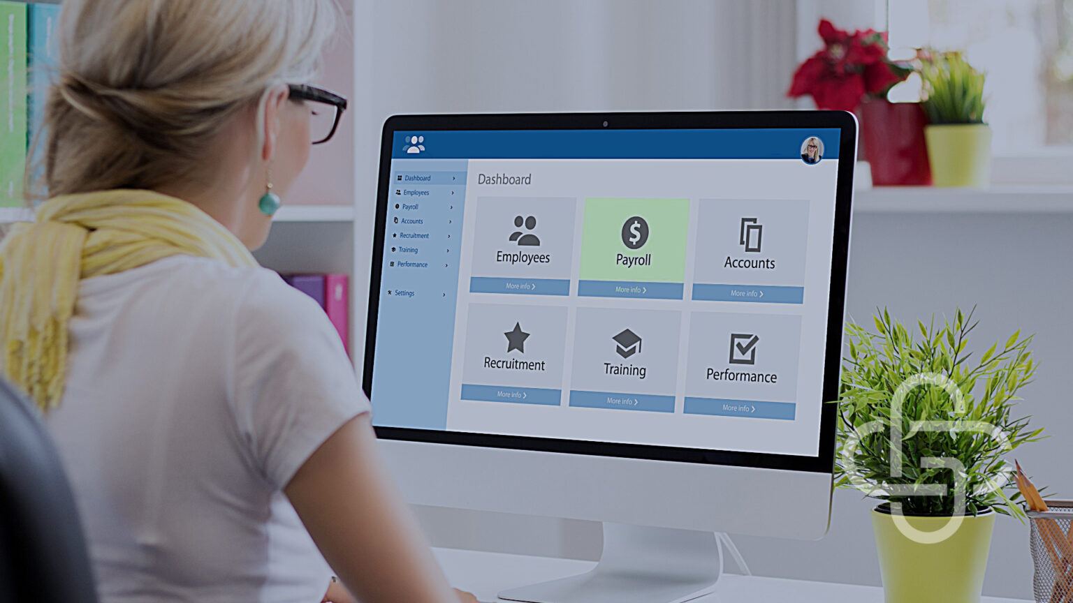 Image of woman using payroll software