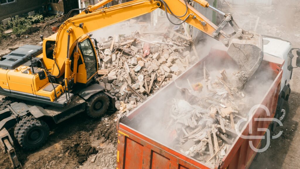 Tractor dumping construction site materials